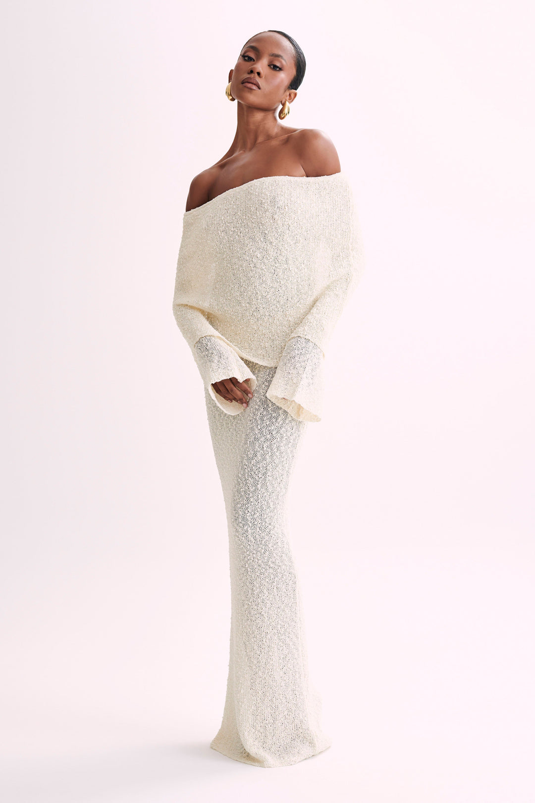 Elegant off-shoulder maxi dress for women, perfect for evening events & parties.