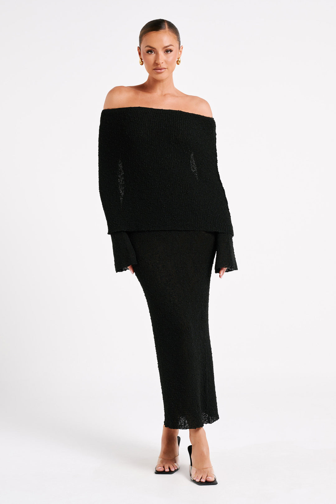 Elegant off-shoulder long sleeve maxi dress, a stunning formal evening outfit for women.