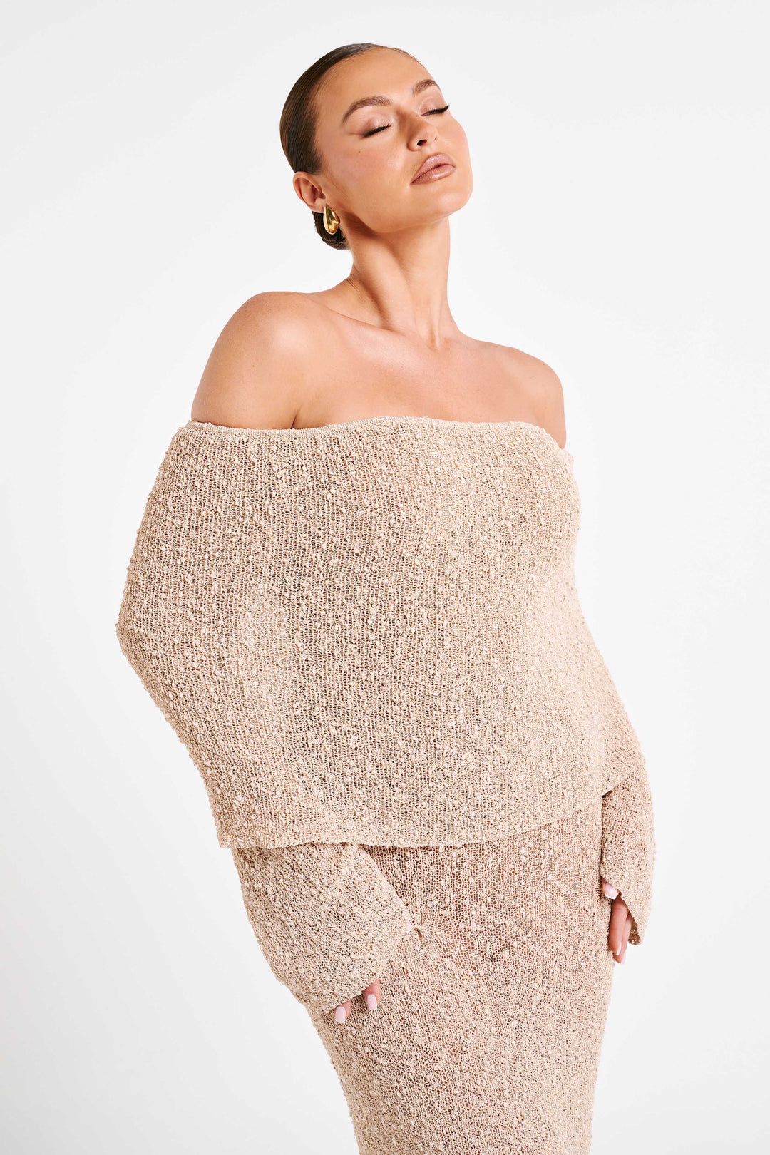 Exquisite women's off-shoulder evening maxi dress, embodying timeless elegance.