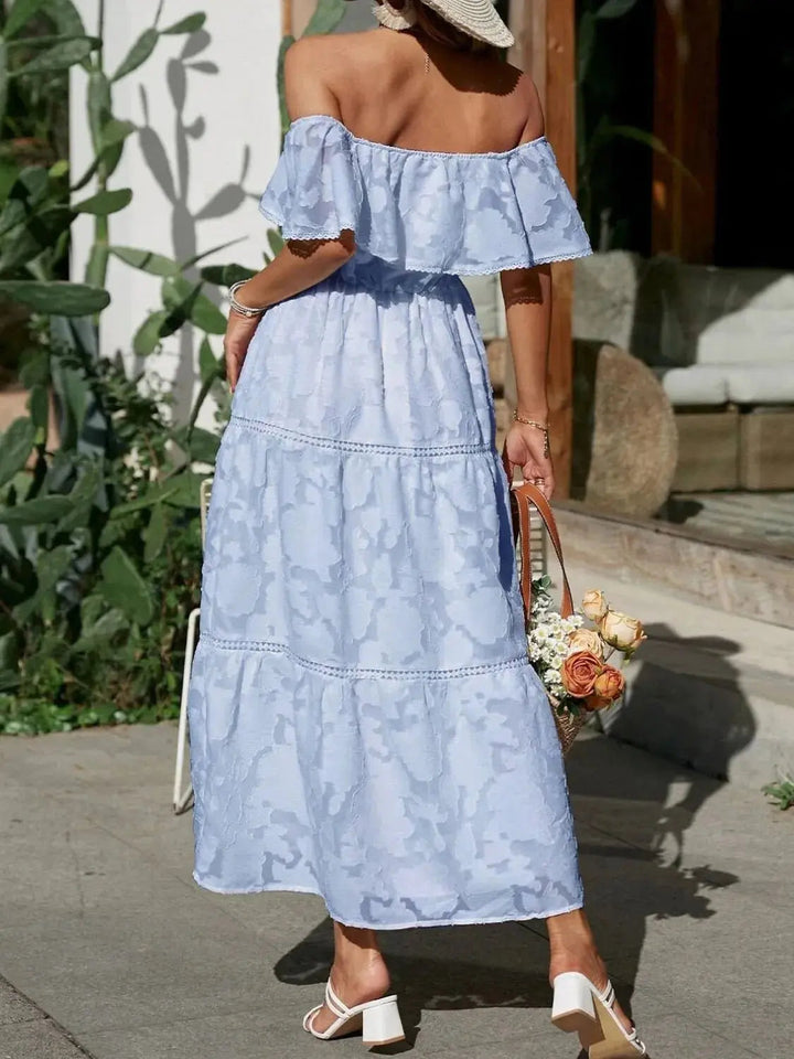 Feminine off-shoulder ruffle maxi dress, offering elegant comfort for summer occasions.