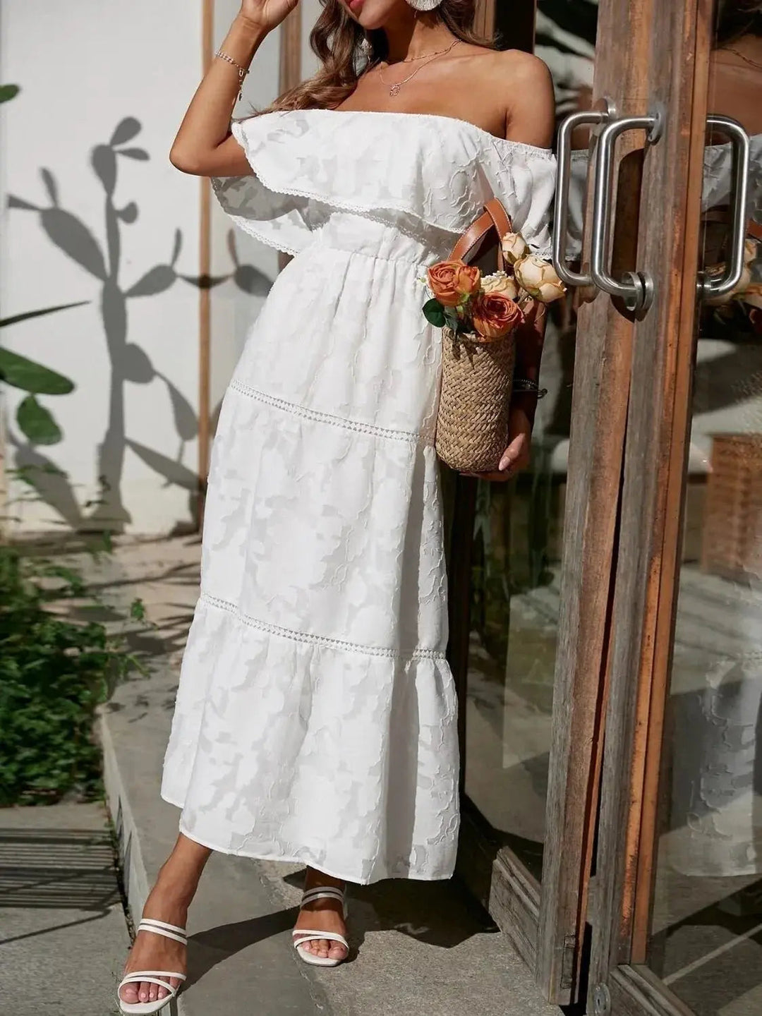 Stylish women's off-shoulder tiered maxi dress, a perfect choice for summer parties.