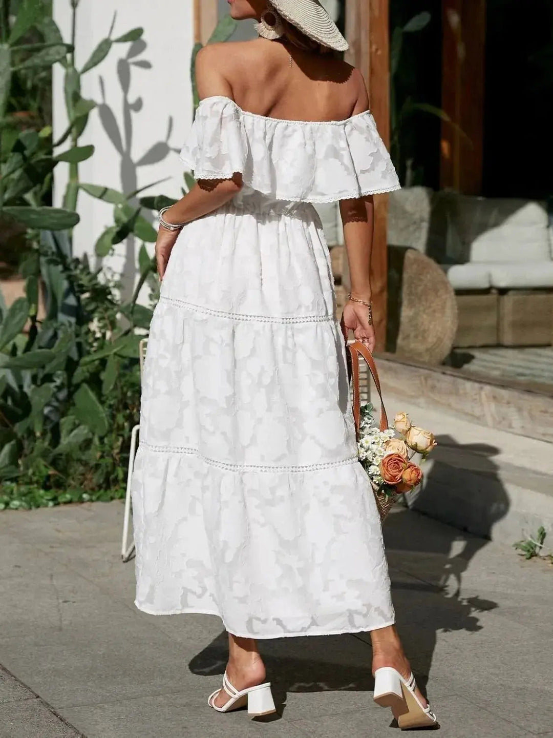 Bardot off-shoulder ruffle maxi dress, providing graceful elegance for summer occasions.