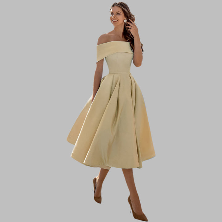 Chic off-shoulder tea-length evening gown with vintage style, ideal for special occasions.
