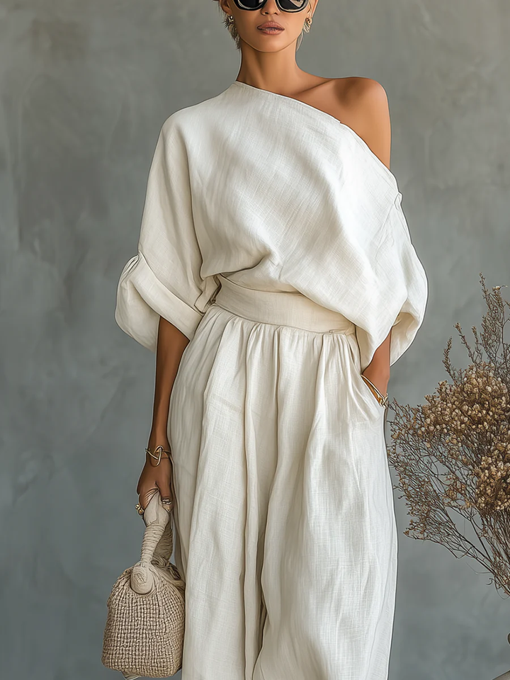 Comfortable off-white women's 2-piece off-shoulder set. Versatile spring/summer outfit for elegant casual wear.