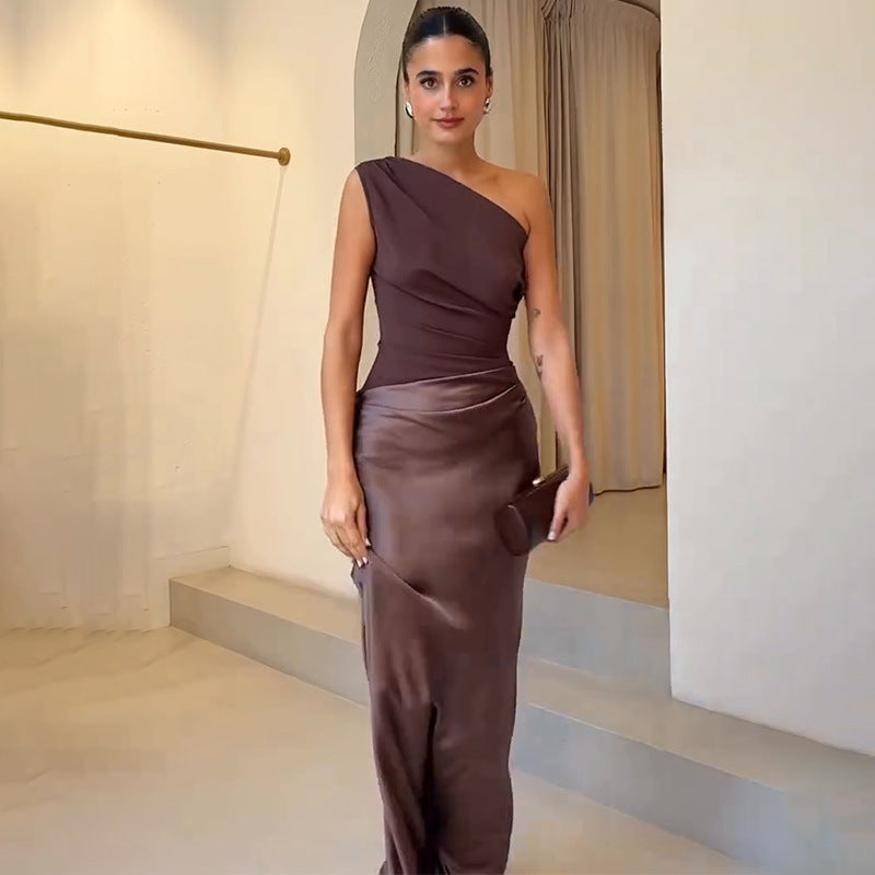 Elegant one-shoulder evening dress for women. Perfect wedding guest gown & formal party wear. Chic & modern design.
