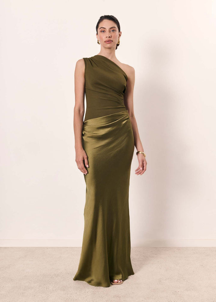 Modern one-shoulder formal dress for women. Sophisticated evening wear, perfect for wedding guests & chic parties.