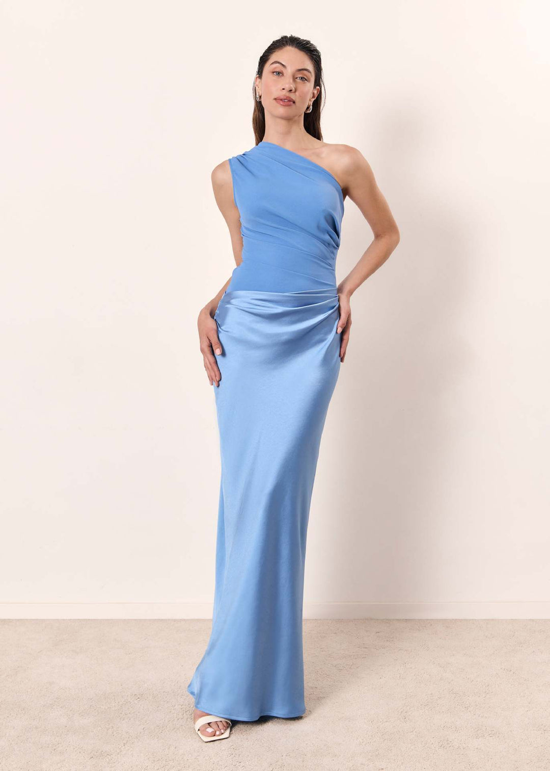 Sleek one-shoulder evening dress for women. Modern formal wear, perfect for wedding guests & elegant events.