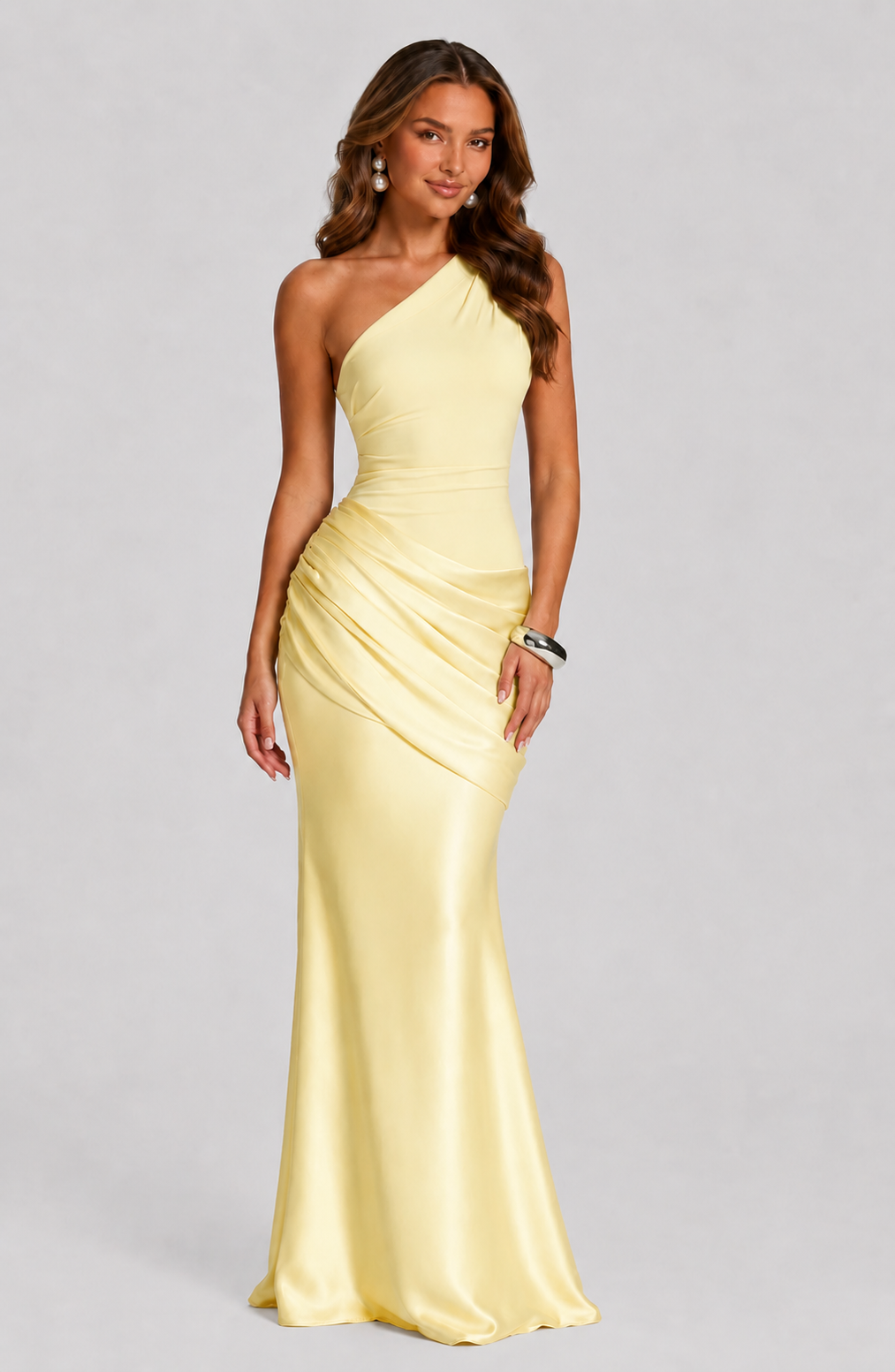 Summer fashion: Elegant women's one-shoulder long dress with a beautiful draped waist.