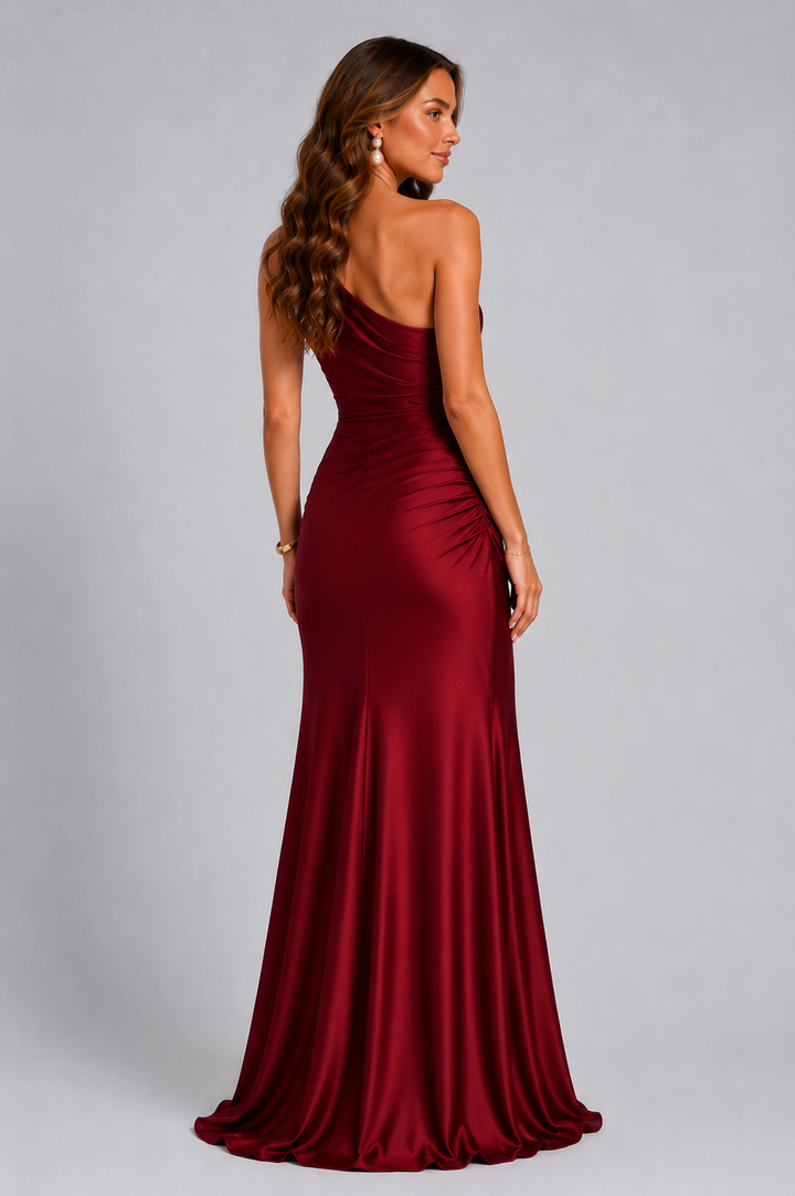 Vacation-ready one-shoulder maxi dress for women, elegant and flowing with a draped waist.