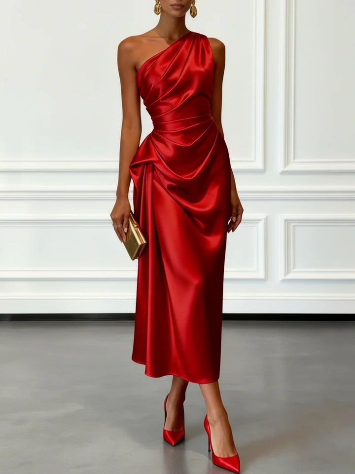 Women's elegant one-shoulder midi dress with flattering ruched details, great for wedding guests.