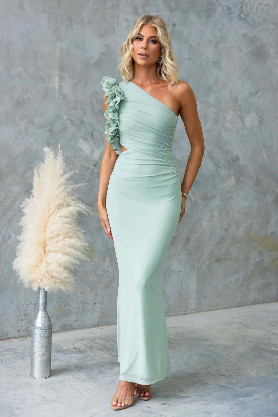 Elegant one-shoulder ruffle dress, a women's maxi style perfect for wedding guests or formal celebrations.