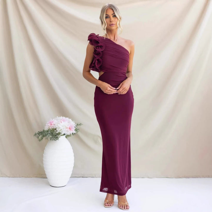 Formal maxi dress for women featuring a stylish one-shoulder design and delicate ruffles, evening wear.