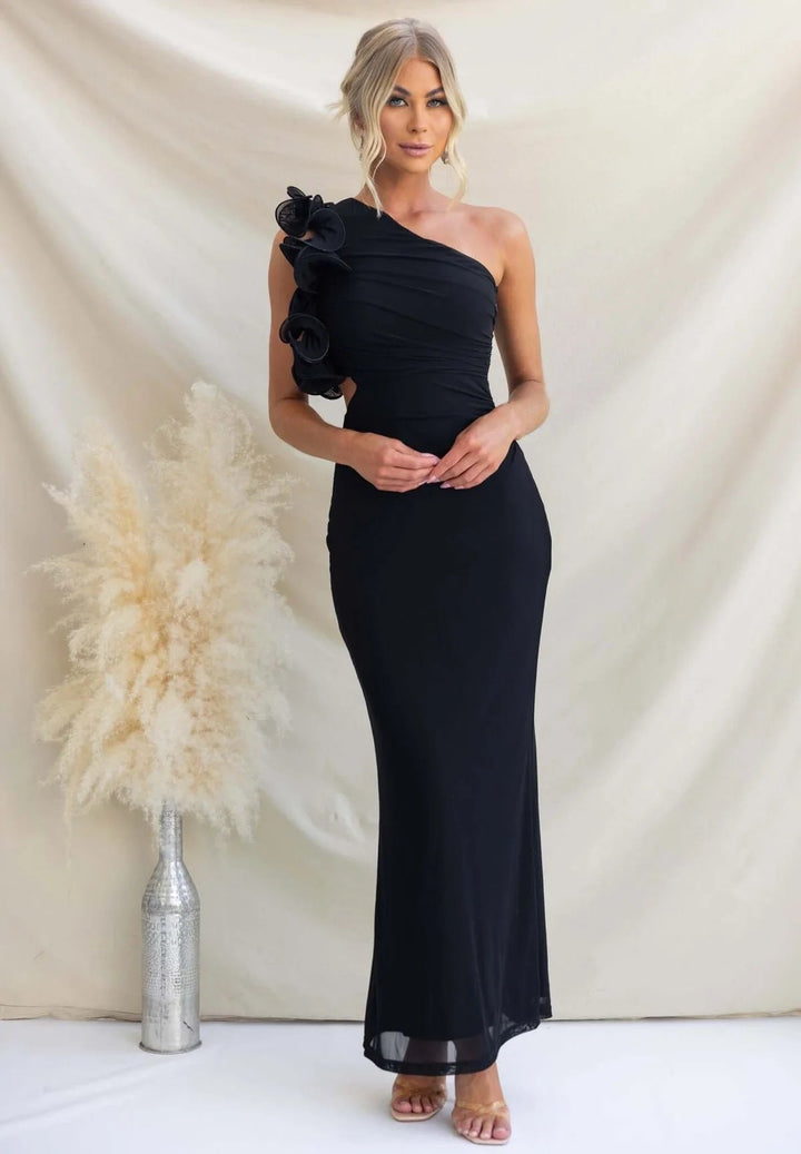 Stunning women's ruffle maxi dress with a sophisticated one-shoulder neckline, ideal for evening wear.