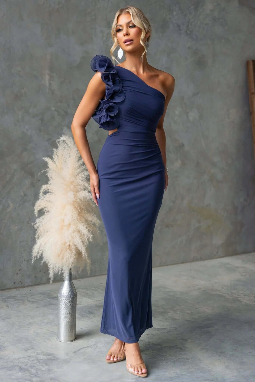 Stylish women's one-shoulder long ruffle dress, a perfect choice for a wedding guest or evening event.