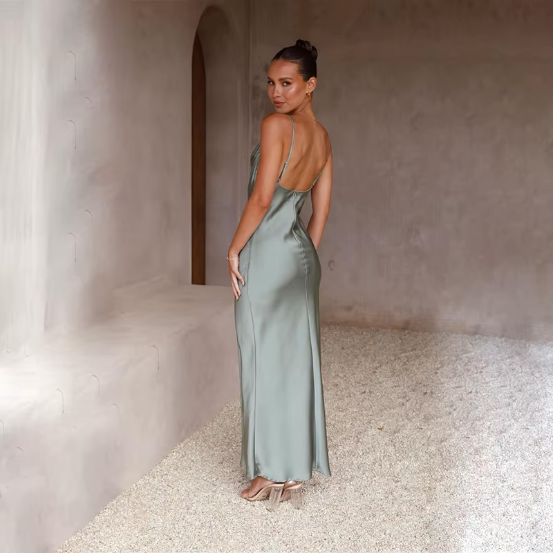 Chic open-back formal dress for women, a stylish long gown for evening wear.