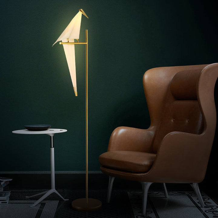 Modern origami bird lamp, providing soft ambient lighting, a stylish decorative piece.