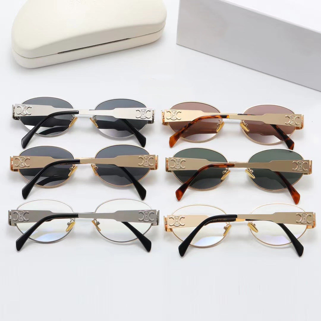 Fashionable women's eyewear: Elegant oval designer shades for UV protection and style.