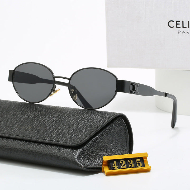 Women's elegant oval designer shades, perfect fashion eyewear with full UV protection.
