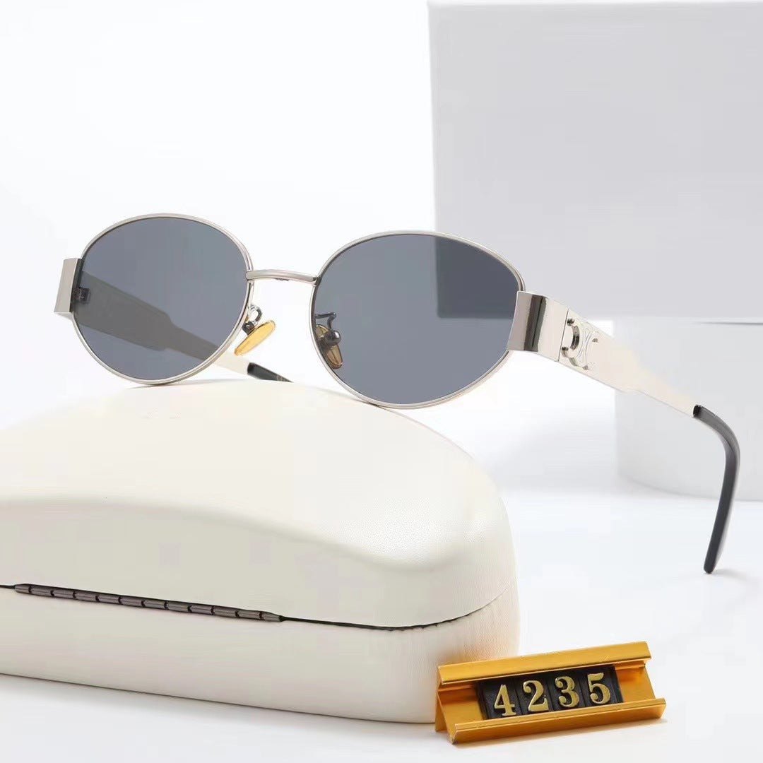 Exquisite oval designer sunglasses for women, combining elegance with superior UV protection.