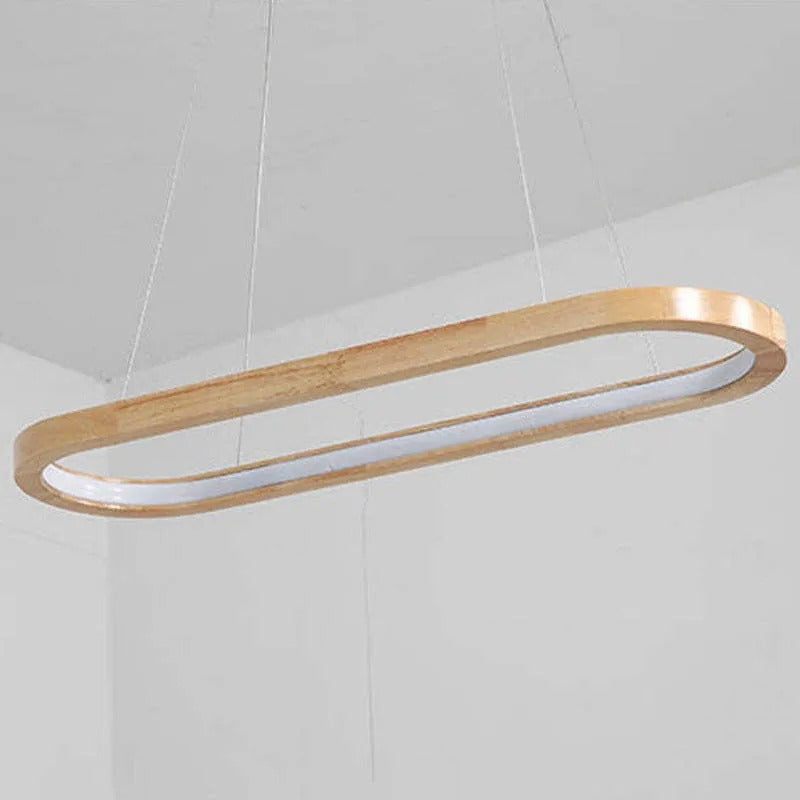 Elegant modern oval light fixture, wood accents & acrylic diffuser, perfect over kitchen islands.