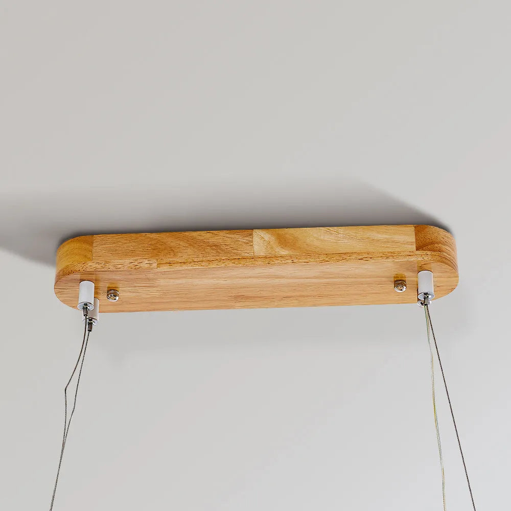 Artistic oval pendant lamp, merging wood and acrylic for a sleek, modern, and inviting look.