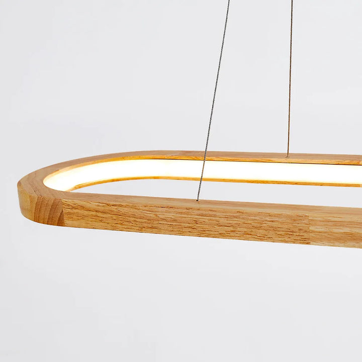 Beautiful oval wood & acrylic pendant light, suspended LED fixture for modern homes and offices.