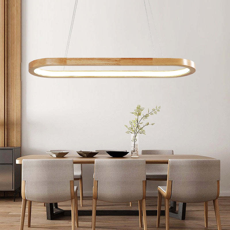 Unique oval wood and acrylic light fixture, perfect for sophisticated kitchen or dining areas.