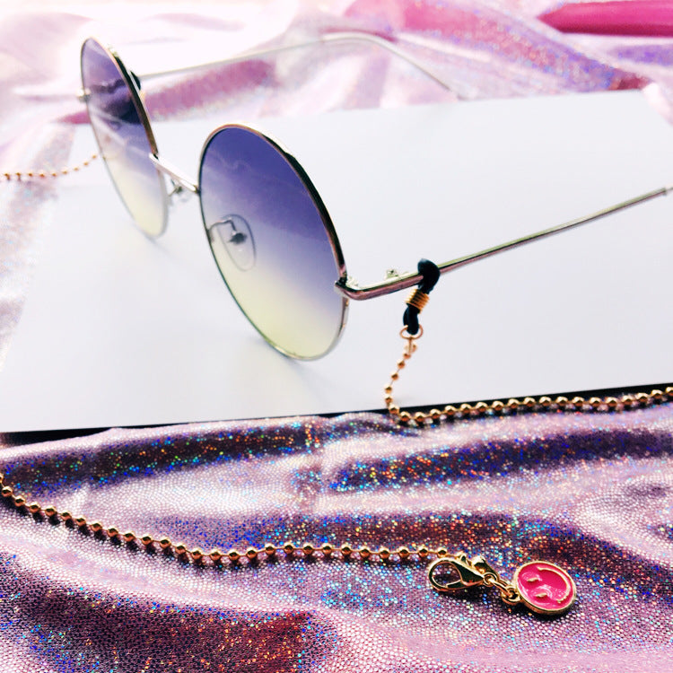 Fashionable women's pearl eyeglass holder chain. Stylish beaded strap for glasses & sunglasses.