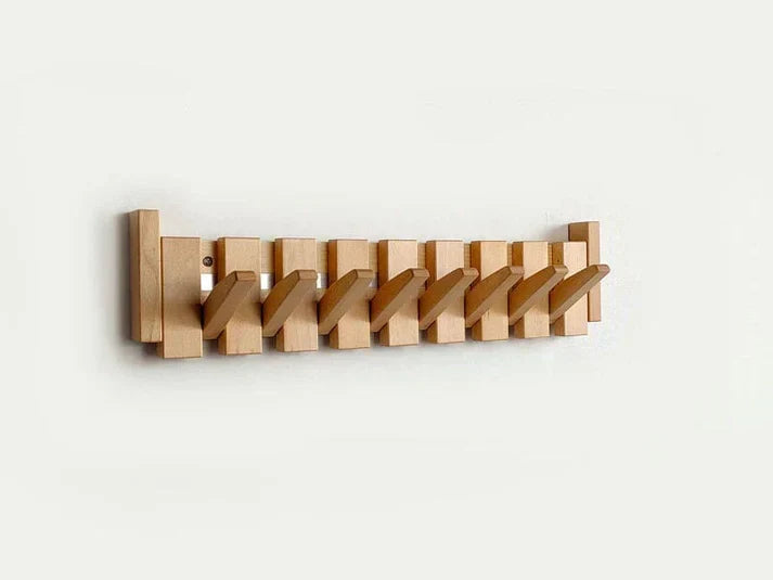 Functional & decorative piano key wall coat rack, a modern entryway organizer for jackets, keys, and bags.