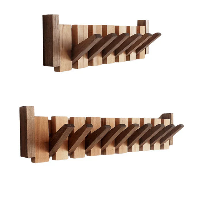 Space-saving walnut wood piano key wall rack for coats & bags. A unique entryway organizer with musical flair.
