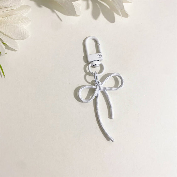 Classic elegant bow keychain, a timeless accessory for handbags, keys, and women's fashion.