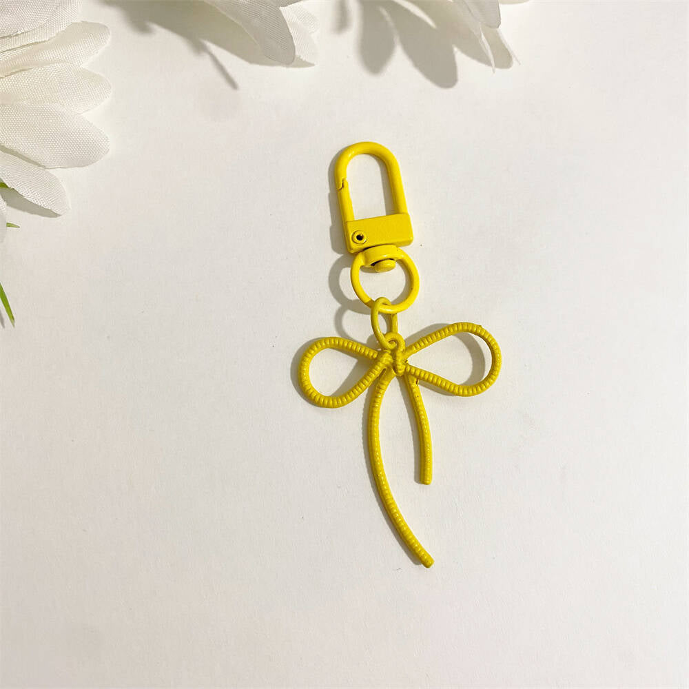 Trendy pink bow key holder, a cute & elegant bag accessory, perfect gift for women.