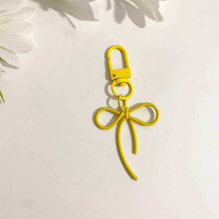 Trendy pink bow key holder, a cute & elegant bag accessory, perfect gift for women.