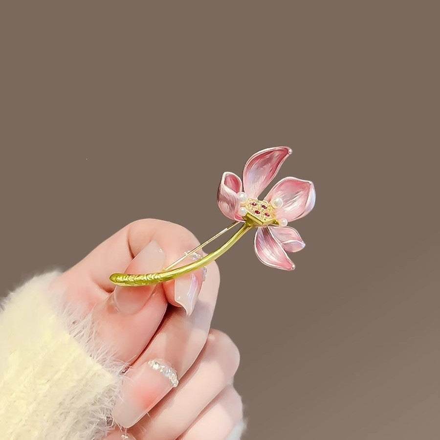 Stylish women's flower brooch pin, an elegant floral accessory & statement piece for her.
