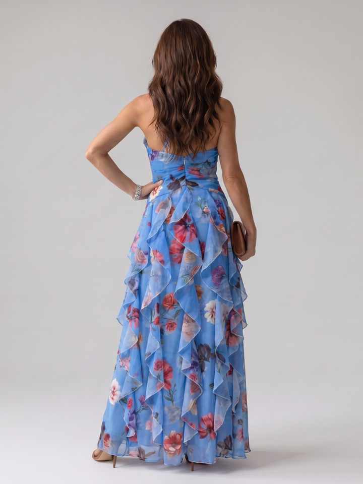 Women's elegant blue halter neck maxi dress, a sophisticated formal gown for evening parties & special occasions.