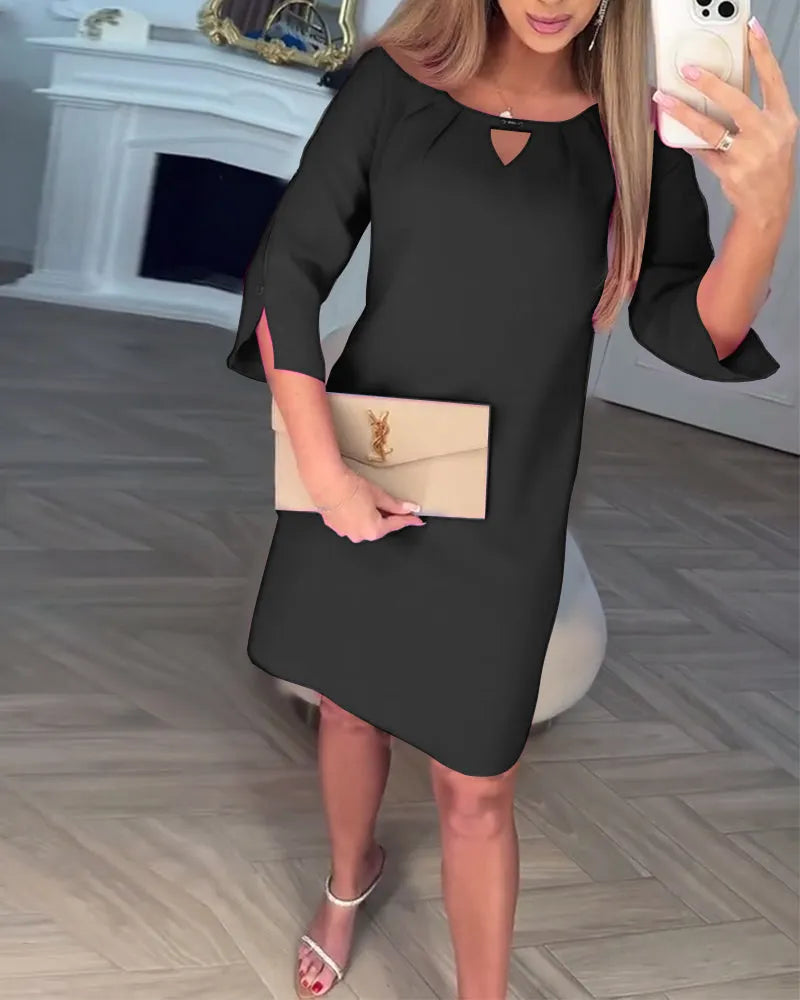 Women's elegant pink midi dress with a modern cutout, perfect for flattering party and evening occasions.