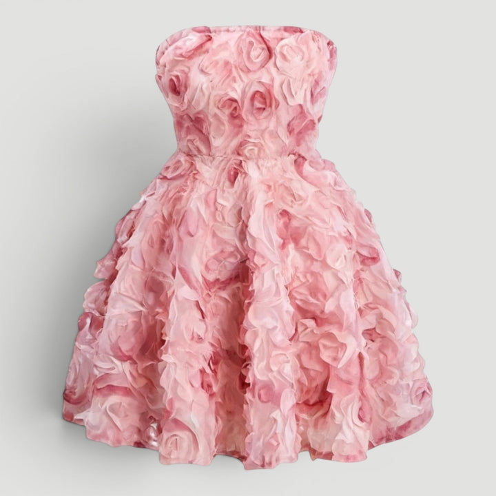 Chic strapless mini cocktail dress in pink for women's parties, an elegant fashion statement for special events.
