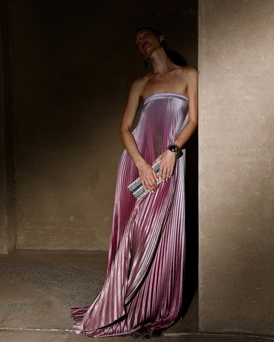 Stylish pink long maxi dress for women, an elegant casual piece. Versatile and comfortable for summer fashion.