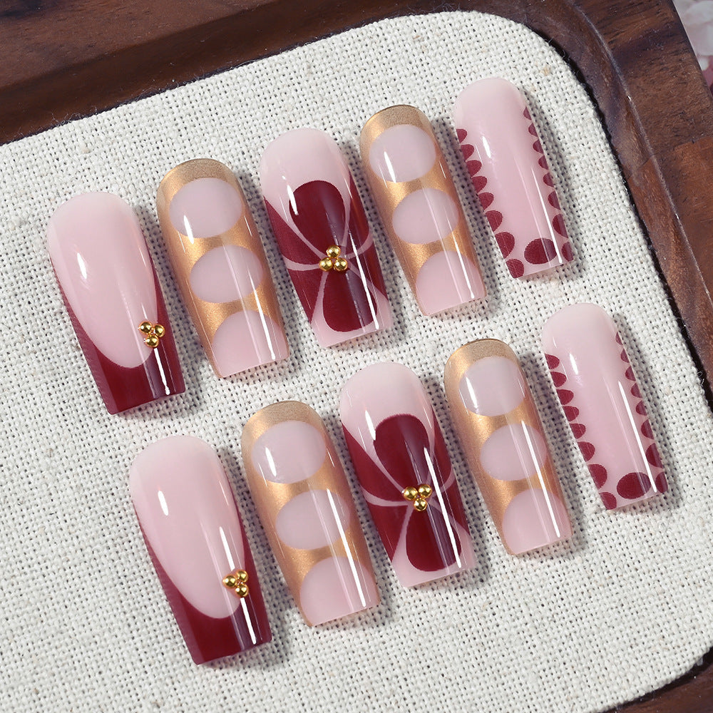 Reusable artificial press-on nails offering quick, elegant nail art for women's instant beauty and convenience.