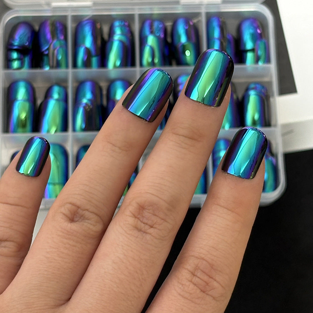 Women's elegant press-on nail art kit with stylish designs. Perfect for a quick, beautiful DIY manicure at home.
