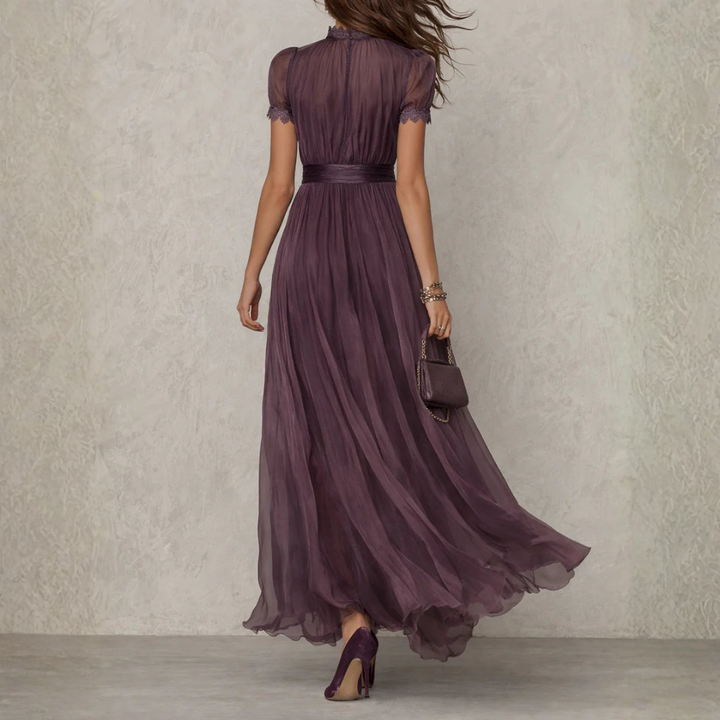 Sophisticated women's lace detail maxi dress with a flowing skirt, ideal as an evening gown or formal party dress.