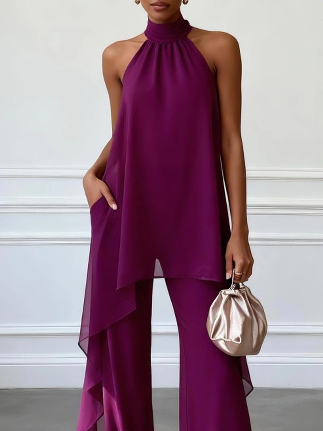 Purple halterneck wide leg women's trouser set. Elegant two-piece outfit suitable for parties & evening wear.