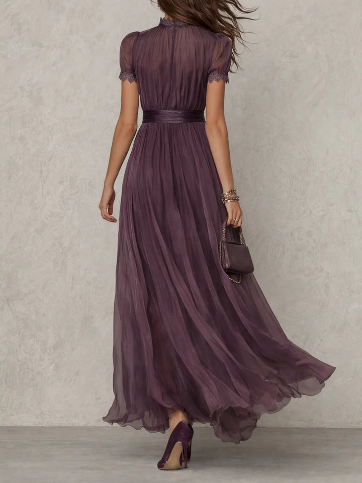 Flowing purple maxi dress for women, with elegant lace trim & gathered waist. Perfect party or evening dress.