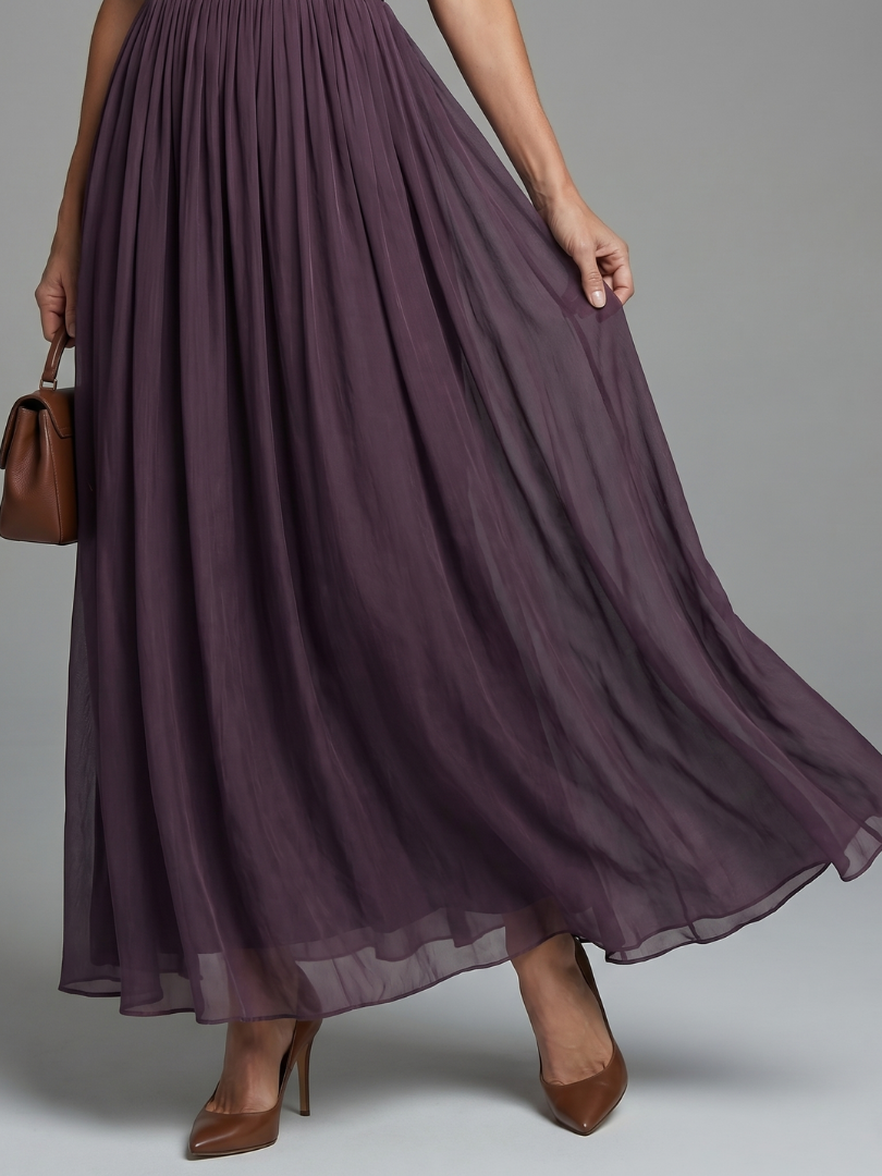 Long women's purple dress with a flattering pleated waist and stylish sheer sleeves, a modest yet elegant formal gown.
