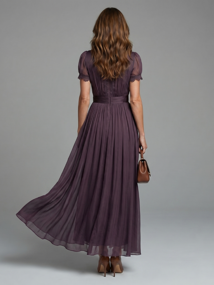 Chic women's purple evening dress; maxi length, pleated waist, and sheer sleeves make it ideal for any formal party.