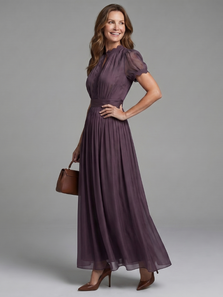 Flowy short sleeve women's maxi dress, comfortable gathered waist & keyhole neckline for casual chic elegance.