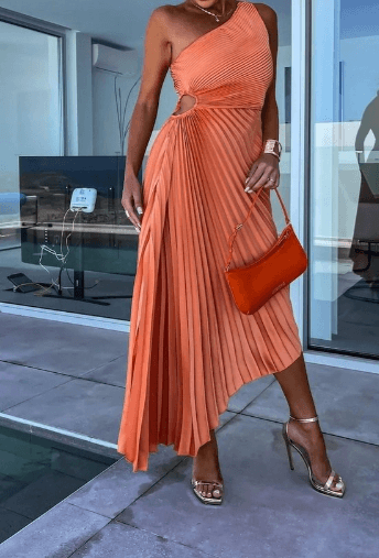 Stylish one-shoulder pleated maxi dress, a beautiful formal dress for wedding guests.