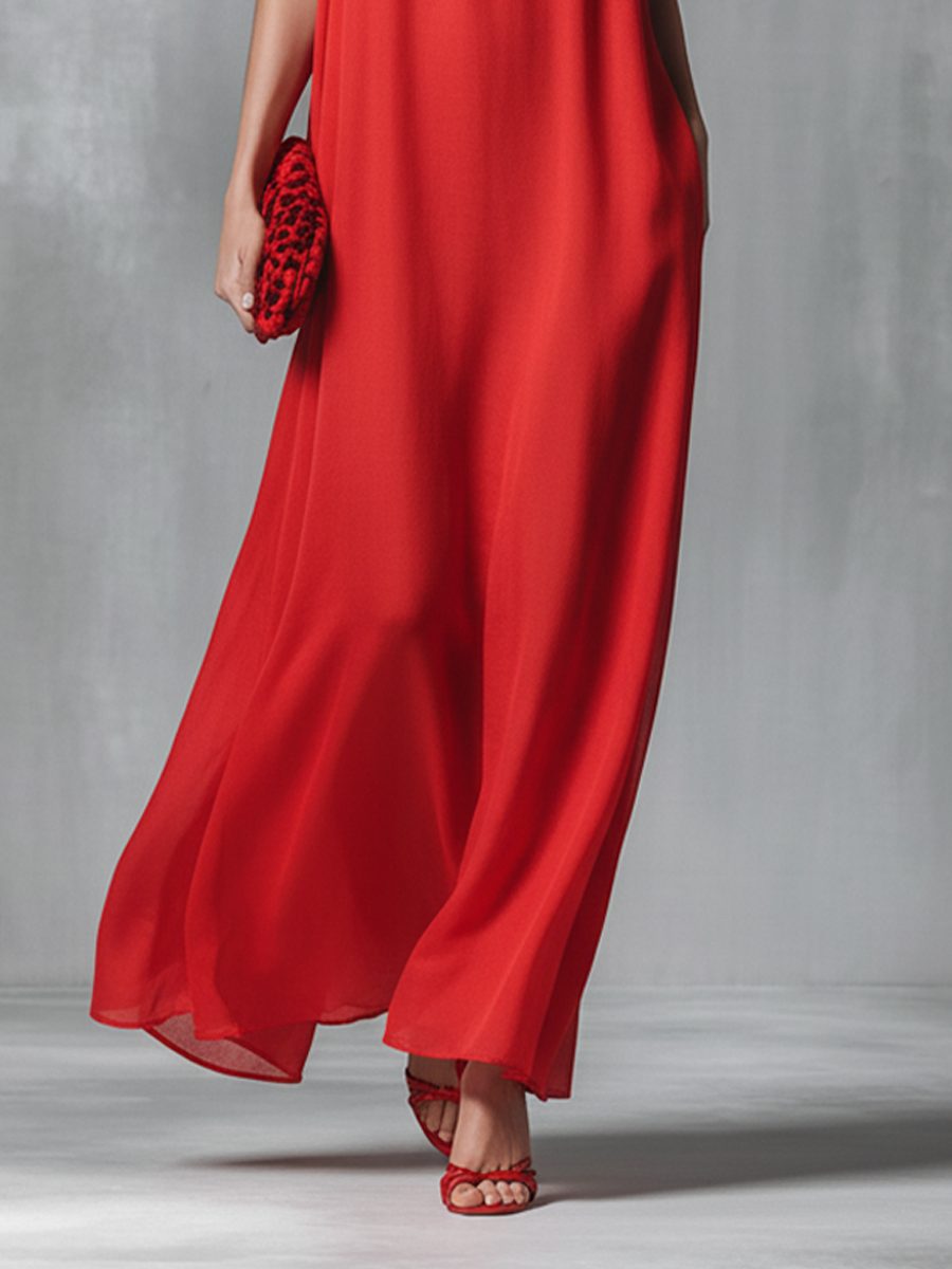 Stunning red women's maxi dress featuring a V-neck & spaghetti straps, great for casual wear or vacation.