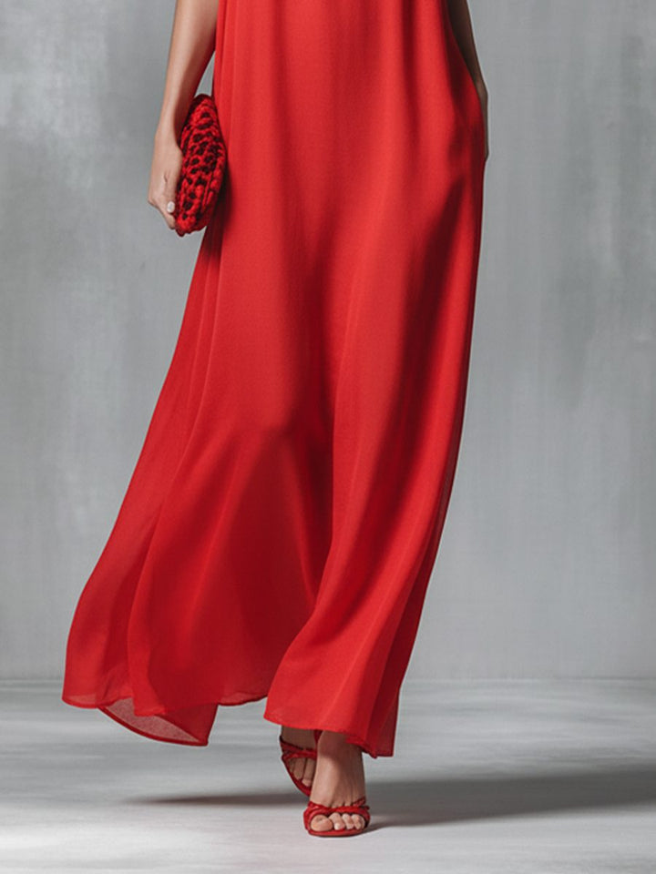 Stunning red women's maxi dress featuring a V-neck & spaghetti straps, great for casual wear or vacation.