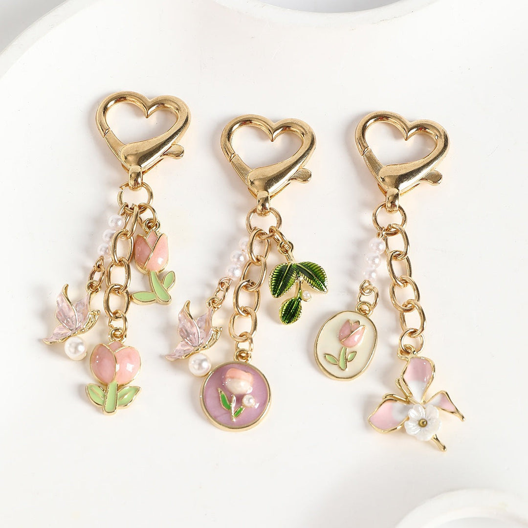 Elegant rose flower keychain for women's bags & keys. Metal & enamel, stylish accessory.